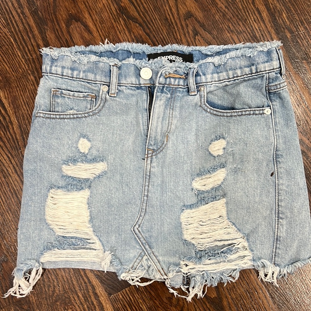 Distressed light wash denim skirt